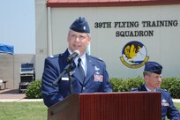Lt. Col. Todd Ernst, 39th Flying Training Squadron assistant director of operations, makes special remarks at the dedication of  Jahns Hall, building 39 at Joint Base San Antonio-Randolph, May 17, 2013. Maj. Peter "Oly" Jahns, a former T-38 instructor pilot, died in a crash March 19, 2003, during a routine training flight at Randolph. (Air Force photo by Richard McFadden)