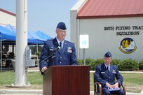 Col. Steven Parker, 340th Flying Training Group commander, makes opening remarks at the dedication of  Jahns Hall, building 39 at Joint Base San Antonio-Randolph, May 17, 2013. Maj. Peter "Oly" Jahns, a former T-38 instructor pilot, died in a crash March 19, 2003, during a routine training flight at Randolph. (Air Force photo by Richard McFadden)