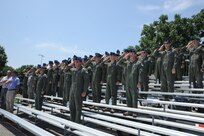 Members of the 39th Flying Training Squadron salute during the dedication of  Jahns Hall, building 39 at Joint Base San Antonio-Randolph, May 17, 2013. Maj. Peter "oly" Jahns, a former T-38 instructor pilot, died in a crash March 19, 2003, during a routine training flight at Randolph. (Air Force photo by Richard McFadden)