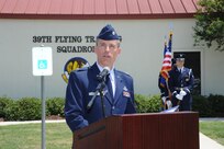 Lt. Col. David Youngdale, 39th Flying Training Squadron assistant director of operations, introduces official party members at the dedication of  Jahns Hall building 39 at Joint Base San Antonio-Randolph, May 17, 2013. Maj. Peter "Oly" Jahns, a former T-38 instructor pilot, died in a crash March 19, 2003, during a routine training flight at Randolph. (Air Force photo by Richard McFadden)
