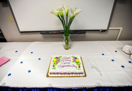 A cake was baked for the Military Spouse Appreciation Event May 16, 2013, at Joint Base Charleston – Air Base, S.C. The event was meant to be a day of recognizing military spouses for their important support roles as well as giving them recognition for the sacrifices they make every day. (U.S. Air Force photo / Airman 1st Class Tom Brading)