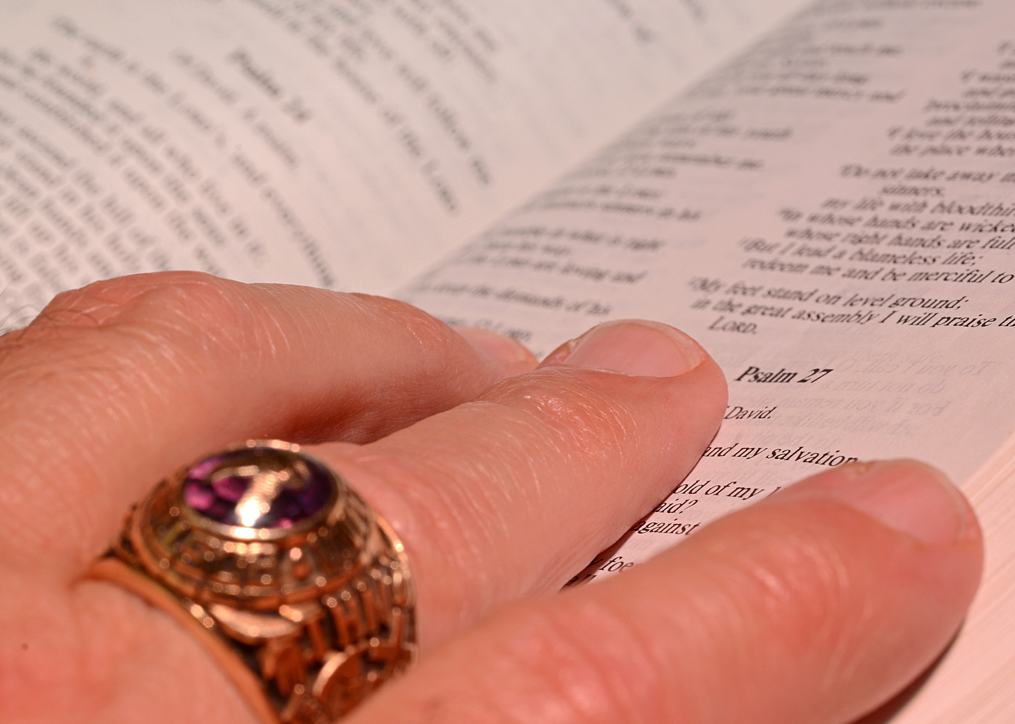 Chaplain (Lt. Col.) John Tillery, reads the Bible at the Aviano Air Base Chapel in Italy May 15, 2013. Once Tillery learned to read in the third grade, he was able to use reading as an escape from his violent home life. (U.S. Air Force photo/Staff Sgt. Ryan Whitney)
