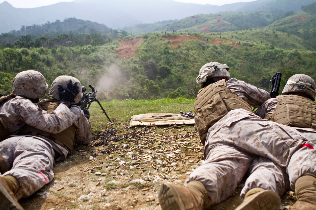 Marines with the landing support platoon, Combat Logistics Battalion-31, 31st Marine Expeditionary Unit, fire M-249 Squad Automatic Weapons during a crew-served weapon shoot here, May 20. The unit is currently conducting CLB Exercise, the 31st MEU’s logistics combat element pre-deployment training, designed to refresh skills and tactics prior to operating outside of garrison. The 31st MEU is the only continuously forward-deployed MEU and is the Marine Corps’ force in readiness in the Asia-Pacific region.