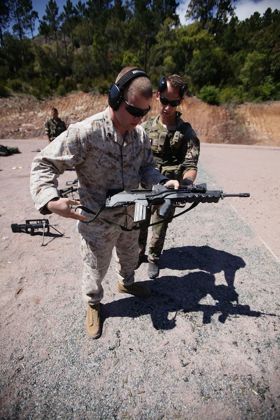 On May 22, United States Marines of 5th Marine Regiment, 1st Marine Division participated in a training exhibition with the French 21st Marine Infantry Regiment, in Frejus, France. The Marines learned about French weapons systems, including the FAMAS G2 assault rifle. Afterward, they were given the opportunity to fire the weapons on a French military operated rifle range. also used kayaks to venture into the Mediterranean Sea, providing them with an opportunity to learn about many of the French marine's reconnaissance tactics. (Official Marine Corps photo by: Cpl. Daniel A. Wulz)