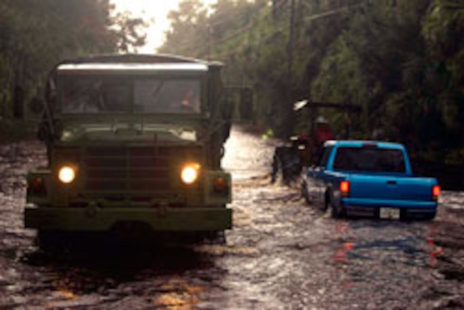 Members of the 2nd Battalion, 124th Infantry Regiment driving a high-water vehicle search flooded roads and properties for people needing assistance or evacuation. The Florida National Guard assisted civilian agencies with nearly 500 Soldiers and Airmen supporting logistical operations and high-water vehicle rescues across central and northern Florida after recent storms.
