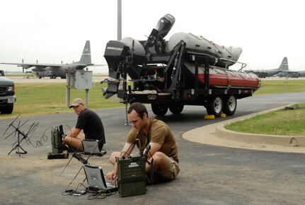 Members of the Kentucky Air Guard's 123rd Special Tactics Squadron prepare radio, navigagtion and rescue gear for deployment to coastal Texas on Sept. 13. About 25 of the unit's pararescuemen, combat controllers and support troops will conduct rescue and relief operations around Houston and Galveston in the wake of Hurricane Ike.