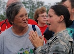 Sgt. Angela Fry, member of 528th Engineer Battalion headquartered in Monroe, La., rejoices with her Aunt, Beverly Goodwich of Hackberry, La. Members of Fry's family were rescued on Sept. 13 by the joint efforts of the Louisiana Department of Wildlife and Fisheries, Calcasieu Sheriff's Department, 225th Engineer Brigade and 256th Infantry Brigade Combat Team after Hurricane Ike flooded the isolated southwestern Louisiana community. 