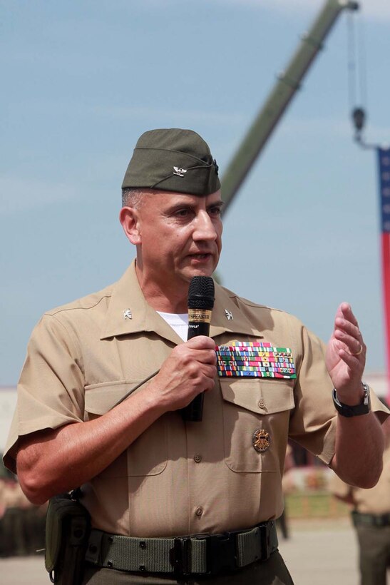Col. James H. Herrera, incoming commanding officer of I Marine Expeditionary Force Headquarters Group, delivers his speech during a change of command ceremony at Camp Pendleton, May 21. Herrera relieved Col. Steven M. Hanson as the commanding officer of I MHG received the unit's guidon to commence his duties.