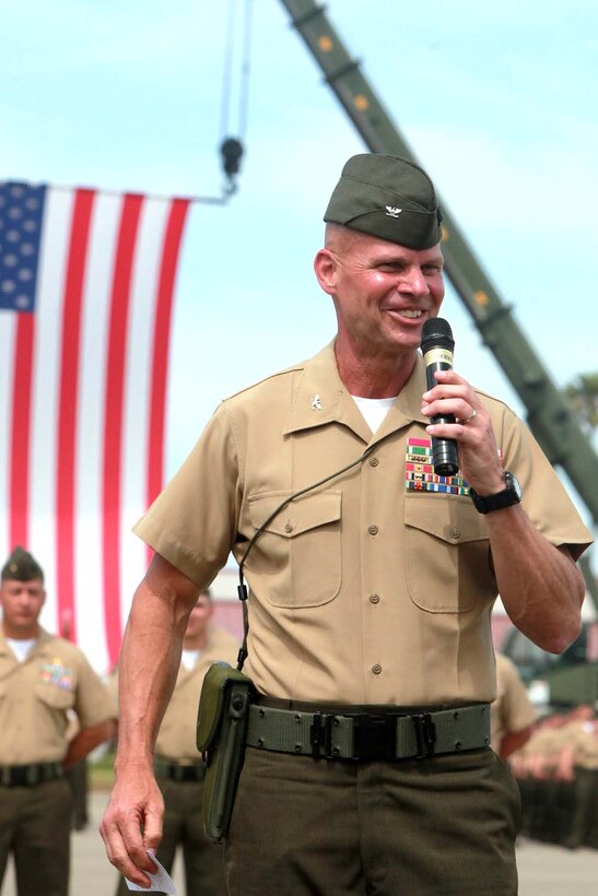 Col. Steven M. Hanson, outgoing commanding officer of I Marine Expeditionary Force Headquarters Group, delivers his speech during a change of command ceremony at Camp Pendleton, May 21. Col. James H. Herrera relieved Hanson as the commanding officer of I MHG and received the unit's guidon to commence his duties.