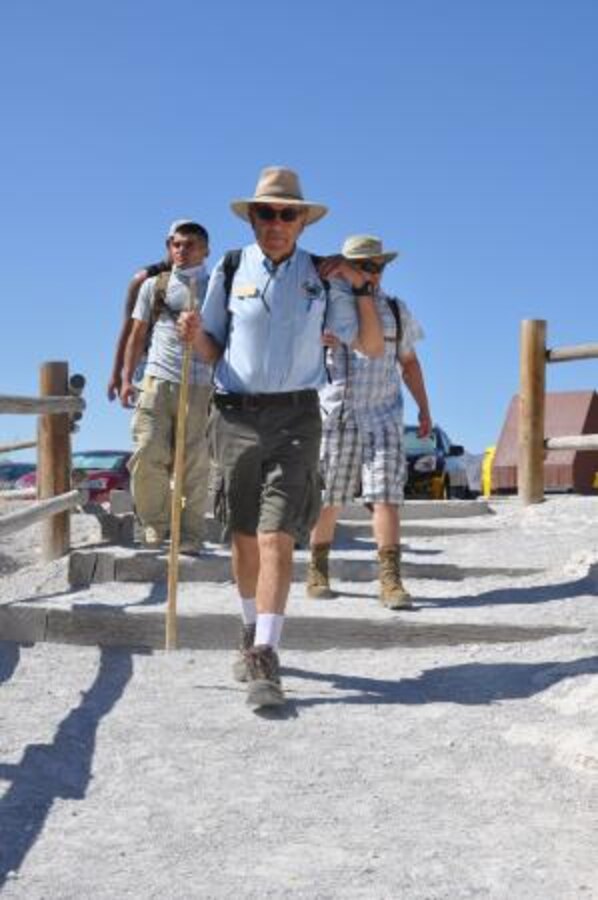 Marvin Saines, Ph.D., an interpretive naturalist and geologist leads MCLB Barstow Marines on a hike through Red Rock Canyon near Las Vegas, May 19.


