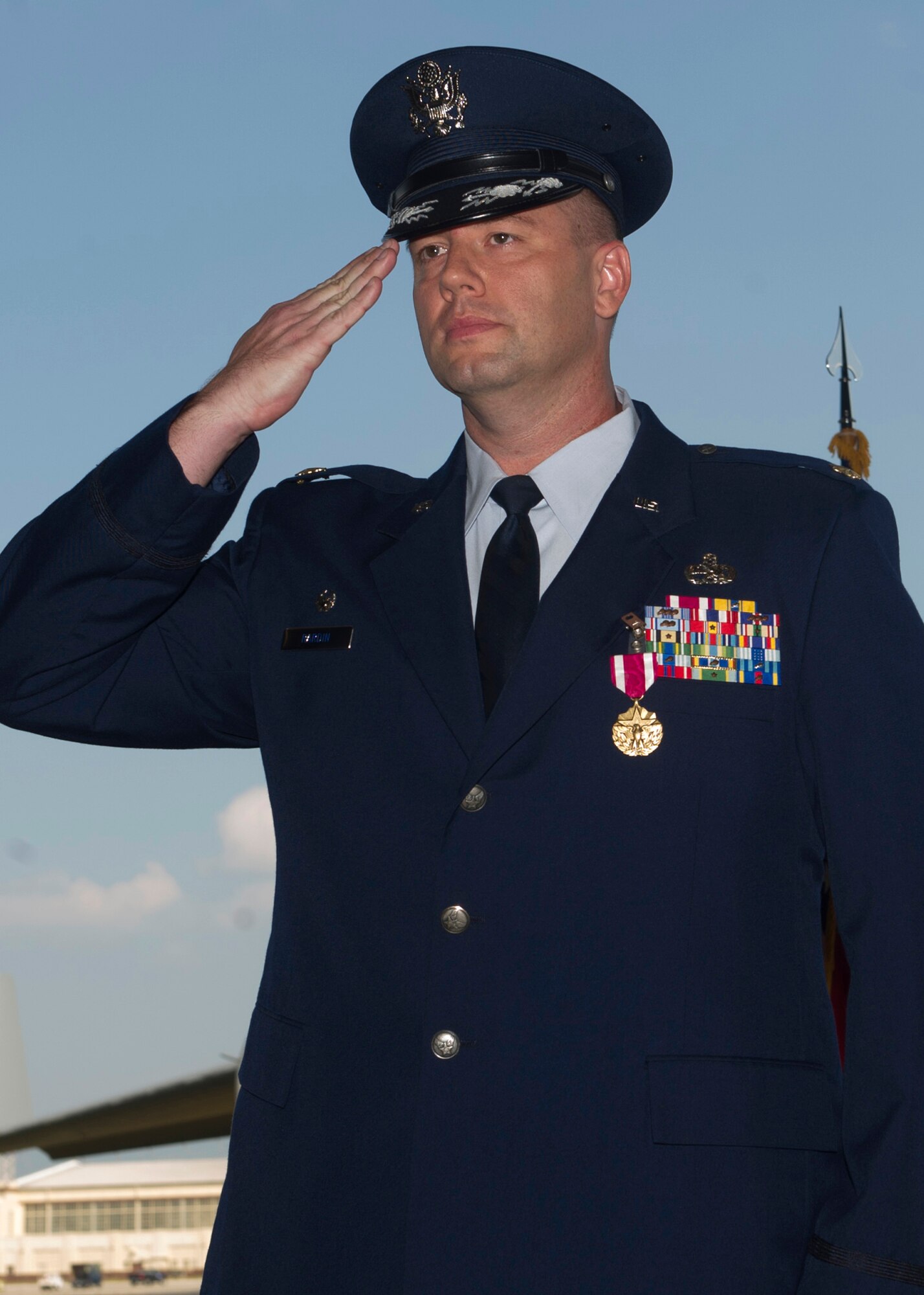 Maj. Mark A. Rardin, 15th Maintenance Operations Squadron commander, renders a final salute to his squadron during the inactivation ceremony of the 15th MOS, at Joint Base Pearl Harbor-Hickam, Hawaii, May 23, 2013; the 15th MOS activated since June 23, 2005.  (U.S. Air Force photo/Tech. Sgt. Jerome S. Tayborn)