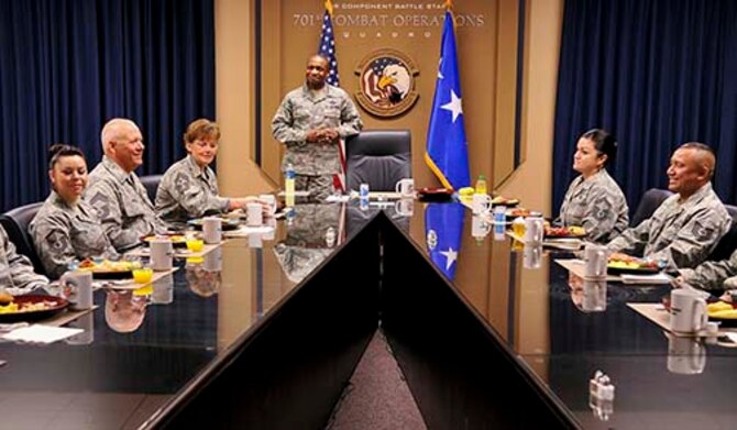 Lt. Gen. Darren McDew, commander, 18th Air Force and Chief Master Sgt. Vicki
Gamble, command chief, 18th Air Force, to his right, meet with March Air
Reserve Base Airmen May 9, to thank them for their service and congratulate
them on the jobs they are doing to support the Air Mobility Command mission.
The numbered Air Force visit was a result of the outstanding efforts of Team
March in support of Superstorm Sandy relief efforts. (U.S. Air Force
photo/Staff Sgt. Jacquelyn Estrada)
