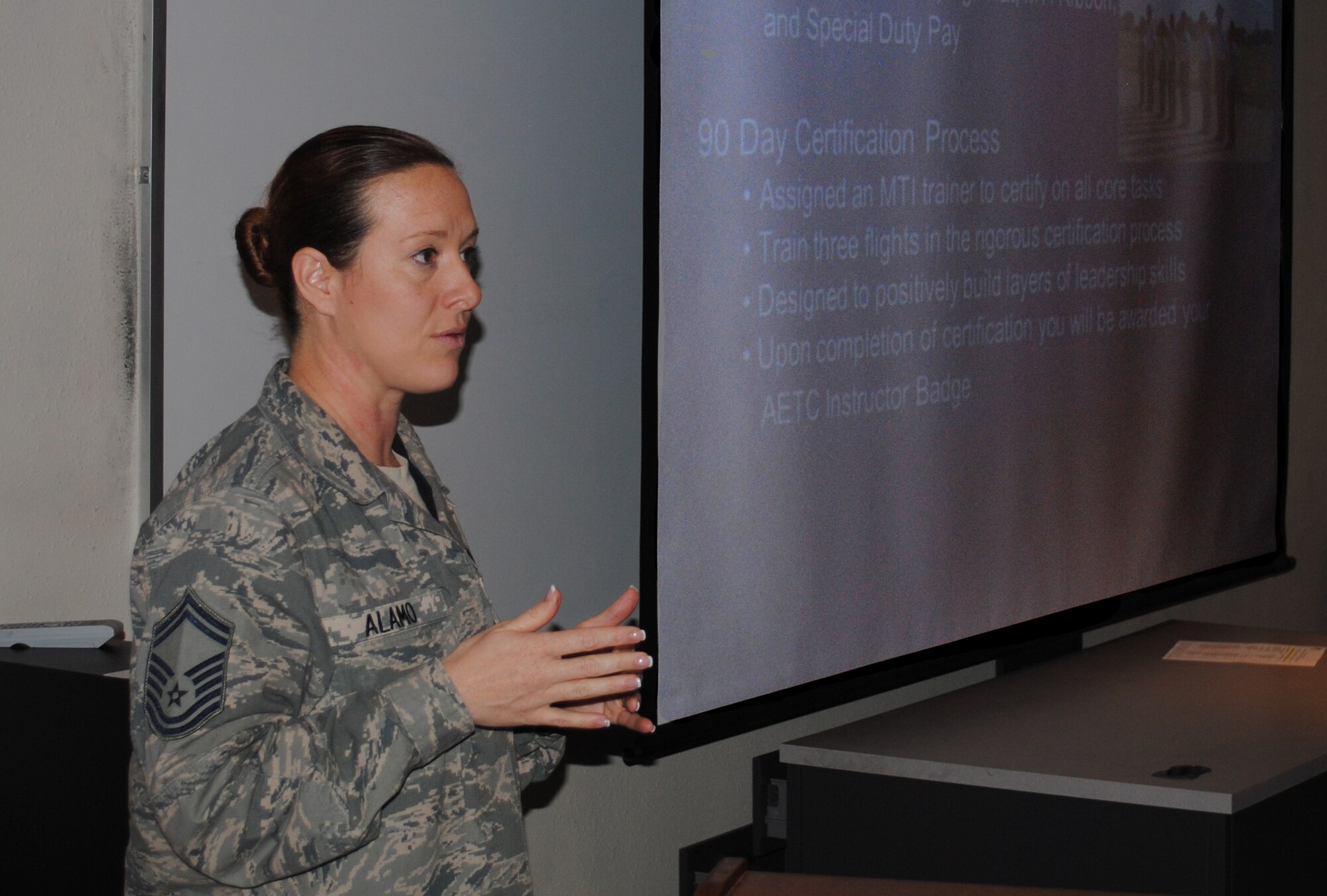 The 319th Force Support Squadron’s own, Senior Master Sgt. Shae Alamo encourages interested Airmen to take advantage of the insight the MTI Shadow Program can provide about becoming a Military Training Instructor. The former 321st Training Squadron MTI trainer spoke to 30 Airmen attending a briefing about Air Force special duties, which took place May 17, 2013, at the base education center on Grand Forks Air Force Base, N.D. (U.S. Air Force photo/Staff Sgt. Luis Loza Gutierrez)