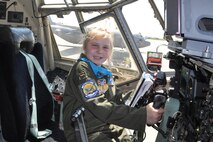 YOUNGSTOWN AIR RESERVE STATION, Ohio -- Nine-year old Kylee Vidas of Howland sits in the pilot seat of a C-130H airplane here May 22, 2013. Kylee was selected by Akron Children's Hospital Mahoning Valley to be honored as a pilot for a day. She is being treated for Type 1diabetes. Kylee was taxied aboard a C-130H Hercules aircraft and given a special tour of the installation. The 910th Airlift Wing pilot for a day program began in 2000 to help bring a ray of sunshine into the lives of children being treated for chronic or life threatening conditions. U.S. Air Force photo by Maj. Brent J. Davis