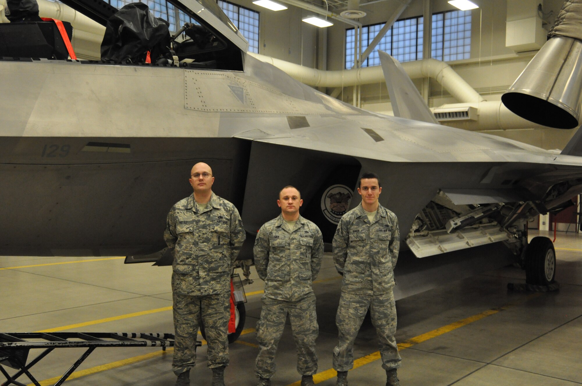 Three Reservists from the 477th Aircraft Maintenance Squadron were recently awarded the 2012 JBER F-22 Load Crew of the Year during a ceremony here May
17. This is the first time that a crew comprised of three Air Force Reserve members have won the JBER F-22 Load Crew of the Year.(U.S. Air Force/ Tech. Sgt. Dana Rosso)
