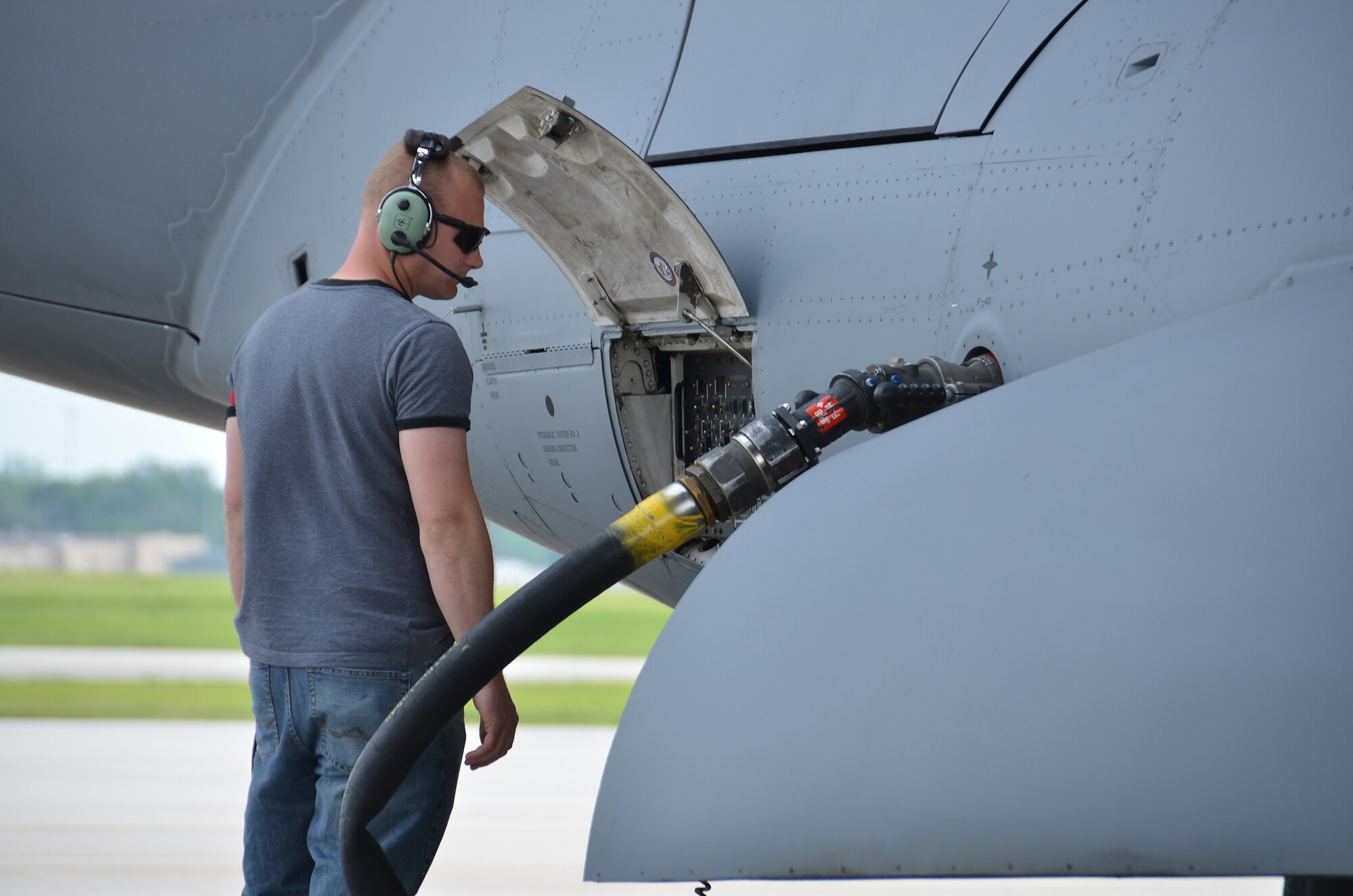 WRIGHT-PATTERSON AIR FORCE BASE, Ohio – Tech. Sgt. Scott Bunch, 445th Aircraft Maintenance Squadron, aircraft mechanic, refuels a 445th Airlift Wing C-17 Globemaster III May 21. (U.S. Air Force photo/Staff Sgt. Mikhail Berlin)