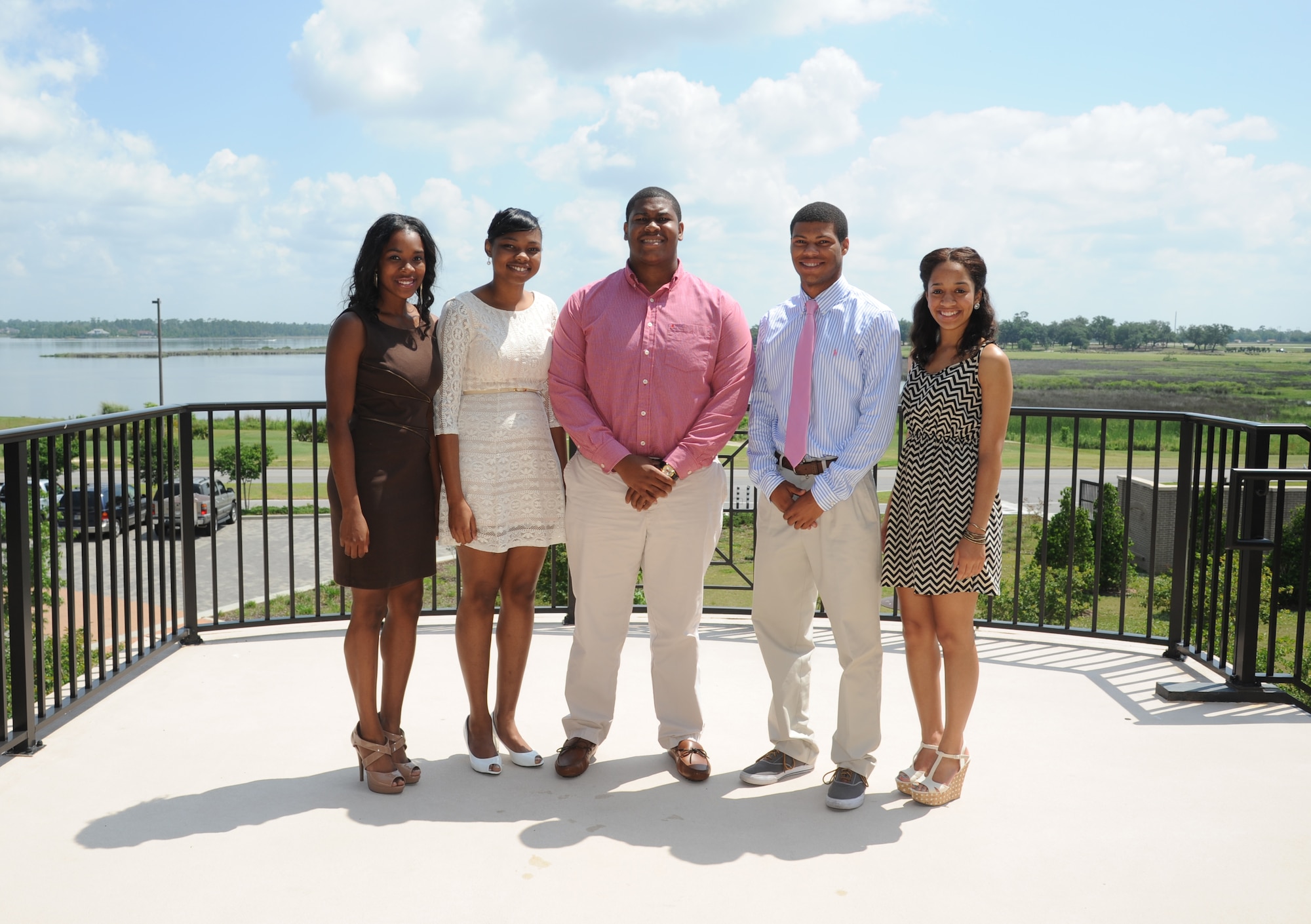 Dependents of Keesler members pose for a photo during a ceremony where they were each awarded $1,000 retired Col. Lawrence Roberts scholarships on behalf of the Keesler African-American Heritage Committee May 23, 2013, at the Bay Breeze Event Center, Keesler Air Force Base, Miss.  For more information about the scholarships or the African-American Heritage Committee call (228) 377-5250.  (U.S. Air Force photo by Kemberly Groue)