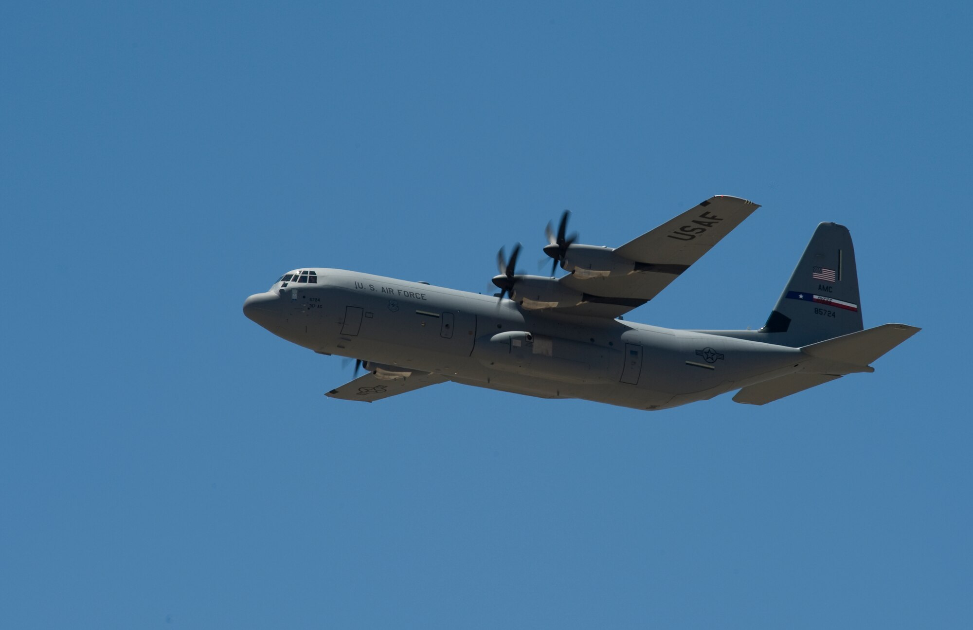 A new U.S. Air Force C-130J flies above Dyess Air Force Base, Texas, May 22, 2013. Dyess has received 27 of 28 J-models, replacing the legacy fleet of the C-130 H-models. (U.S. Air Force photo by Senior Airman Jonathan Stefanko/Released)