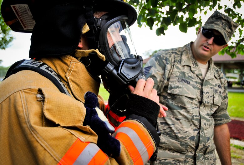 Duke Field firefighters put on a demonstration for the kids after their Fun Run May 5.  Almost 50 Airmen ran out for this year's 5k.  (U.S. Air Force photo/Tech. Sgt. Jon McCallum)