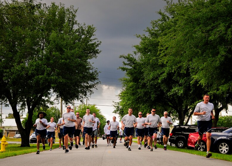 Almost 50 Airmen ran out for the 5K race at Duke Field, Fla.  Also part of the run were stations that Airmen had to stop at and perform calisthenics.  (U.S. Air Force photo/Tech. Sgt. Samuel King Jr.)