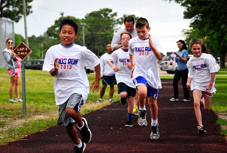 Kids sprint at the beginning of their Fun Run race May 5 at Duke Field.  Almost 10 children participated in the run and almost 50 Airmen ran the 5k.  (U.S. Air Force photo/Tech. Sgt. Samuel King Jr.)