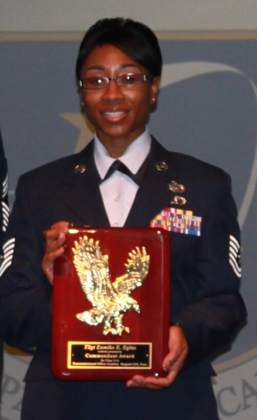 Tech. Sgt. Eumiko Egins took home the Commandant's Award for NCO Academy Class 13-04 during graduation at Sheppard Air Force Base, Texas, May 23, 2013. Egins is from the 71st Fighter Training Wing at Vance Air Force Base, Okla. (U.S. Air Force courtesy photo) 

