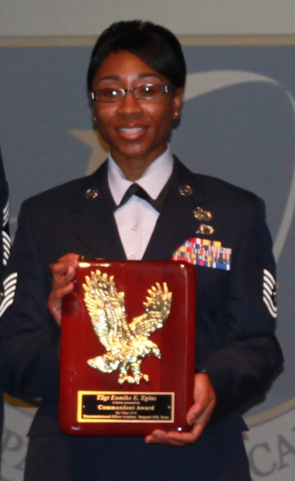 Tech. Sgt. Eumiko Egins took home the Commandant's Award for NCO Academy Class 13-04 during graduation at Sheppard Air Force Base, Texas, May 23, 2013. Egins is from the 71st Fighter Training Wing at Vance Air Force Base, Okla. (U.S. Air Force courtesy photo) 

