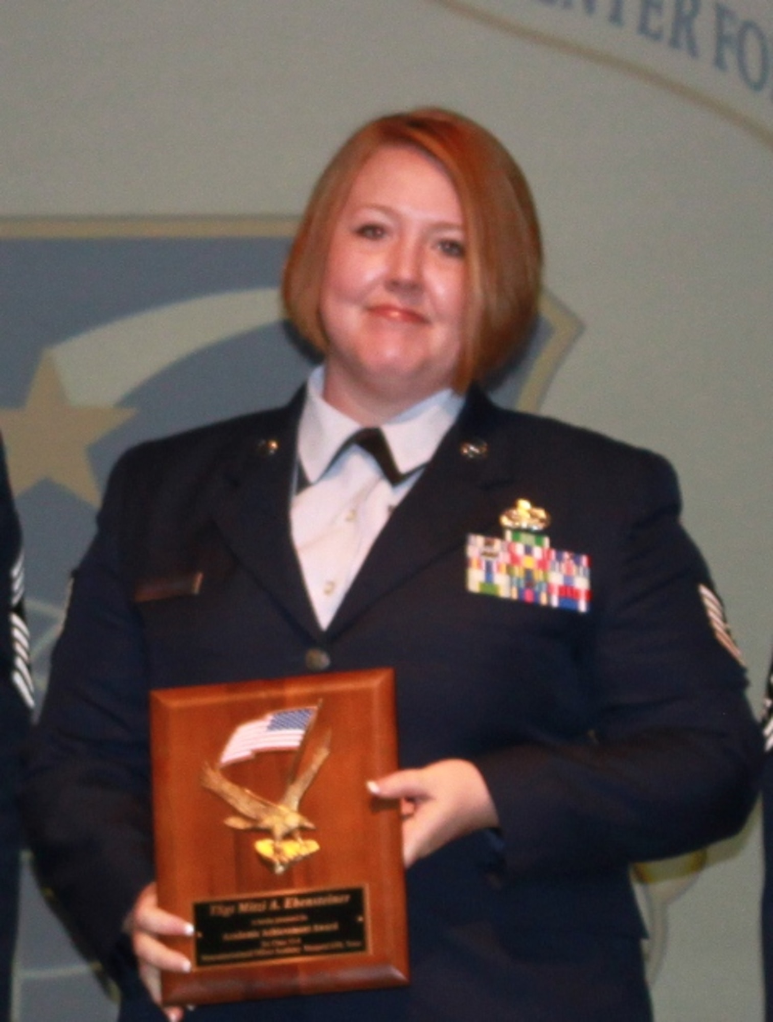 Tech. Sgt. Mitzi A. Ebensteiner of the 56th Logistics Readiness Squadron at Luke Air Force Base, Ariz., was named the Academic Achievement award winner for NCO Academy Class 13-04 during graduation at Sheppard Air Force Base, Texas, May 23, 2013.  Ebensteiner also garnered a distinguished graduate award during the ceremony. (U.S. Air Force courtesy photo) 

