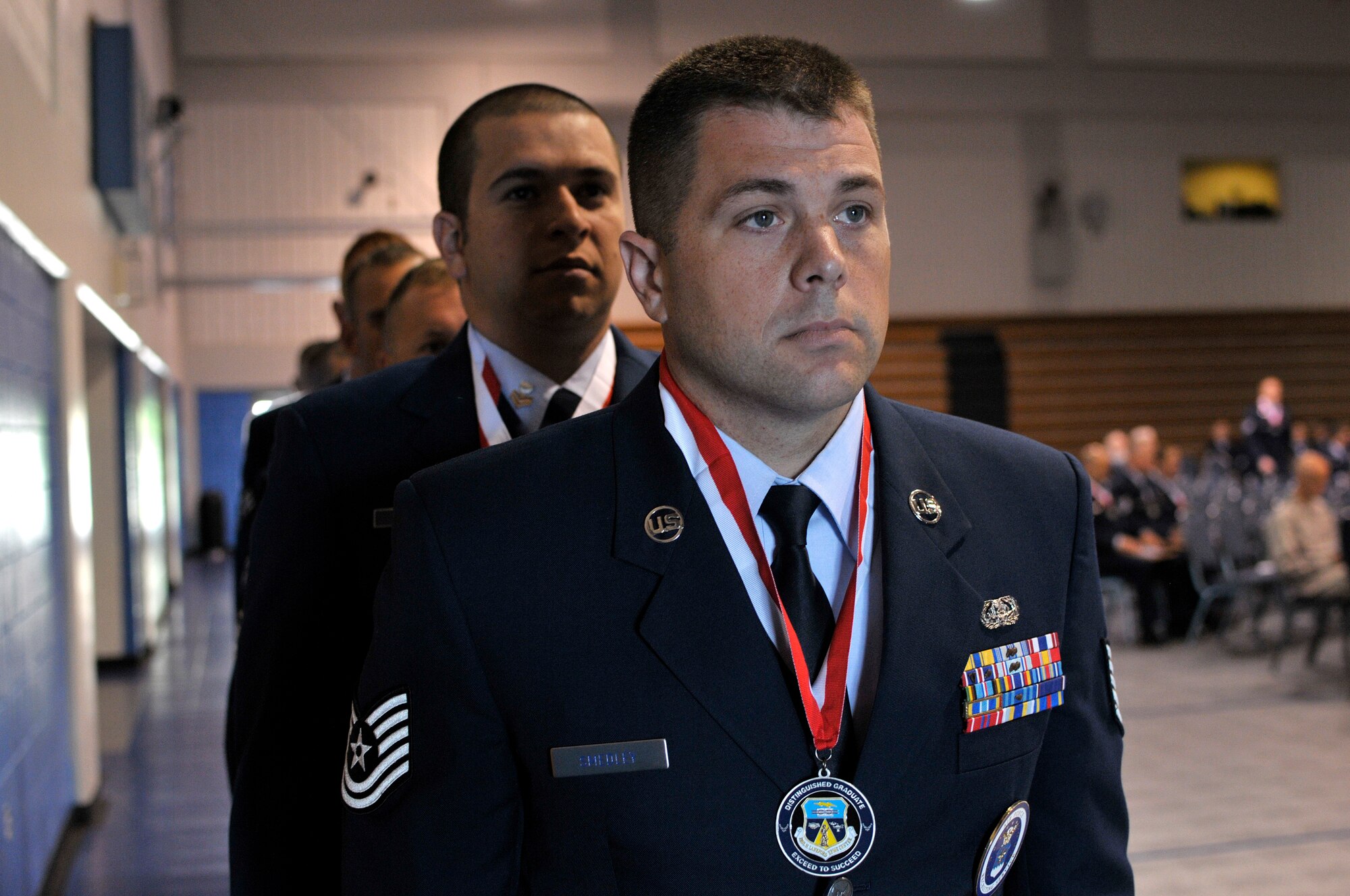 MCGHEE TYSON AIR NATIONAL GUARD BASE, Tenn. – U.S. Air National Guard Tech. Sgt. Sean Smedley, from Wisconsin, graduates Air Force Noncommissioned Officer Academy as a Distinguished Graduate here May 23, 2013, at the Paul H. Lankford Enlisted Professional Military Education Center. Smedley and others from his class joined Airman Leadership School graduates in the ceremony that featured guest speaker Chief Master Sgt. Richard A. "Andy" Kaiser, command chief of U.S. Air Force Air Mobility Command. (U.S. Air National Guard photo by Master Sgt. Mike R. Smith/Released)