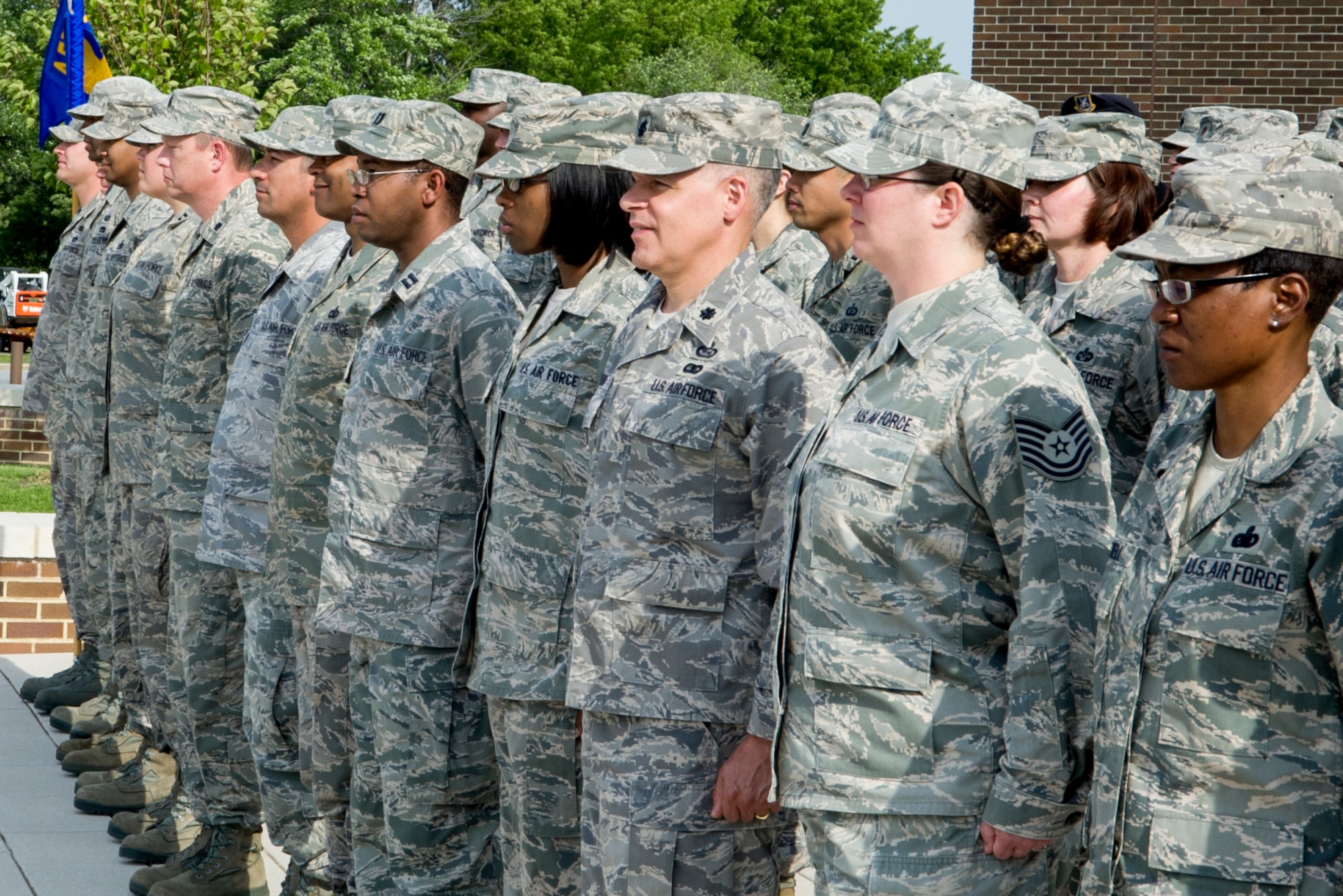Headquarters Air Force District of Washington Airmen participate in HQ AFDW’s first retreat ceremony at the Jones Building May 16, 2013 on Joint Base Andrews, Md. AFDW is the parent command to the 11th Wing, 79th Medical Wing, 844th Communications Group and two ceremonial elements. (U.S. Air Force photo by Senior Airman Tabitha N. Haynes)
