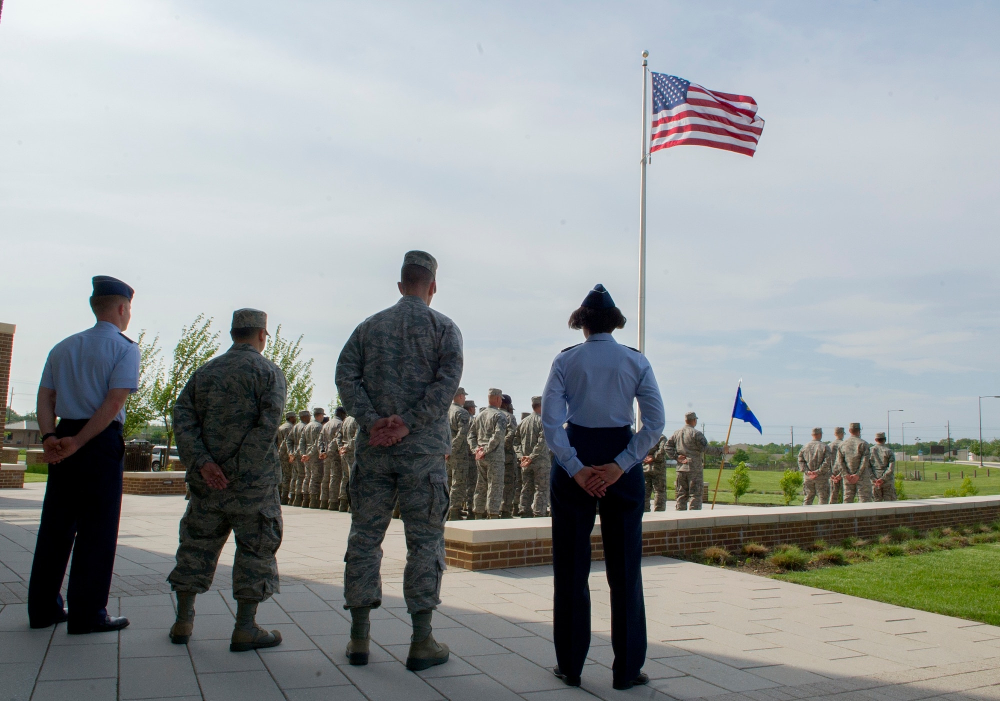 Headquarters Air Force District of Washington leadership participates in HQ AFDW’s first retreat ceremony at the Jones Building May 16, 2013 on Joint Base Andrews, Md. As one of the U.S. Air Force’s three direct reporting units, AFDW executes Air Force operations and supports joint force and inter-agency operations in the National Capital Region while providing superior support to combatant commanders and Air Force elements worldwide. (U.S. Air Force photo by Senior Airman Tabitha N. Haynes)
