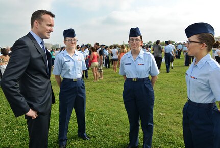 Under secretary of the Air Force Eric Fanning congratulates a group of Airmen after graduating basic training May 17,  2013, at Joint Base San Antonio-Lackland, Texas. Fanning visited with members of Joint Base San Antonio May 16 and 17 with stops at Randolph, Lackland, and Fort Sam Houston as part of his first base visit as under secretary. The under secretary is responsible for Air Force matters on behalf of the secretary of the Air Force to include the organizing, training, equipping and providing for the welfare of its total force Airmen and their families. (U.S. Air Force photo/Benjamin Faske) 