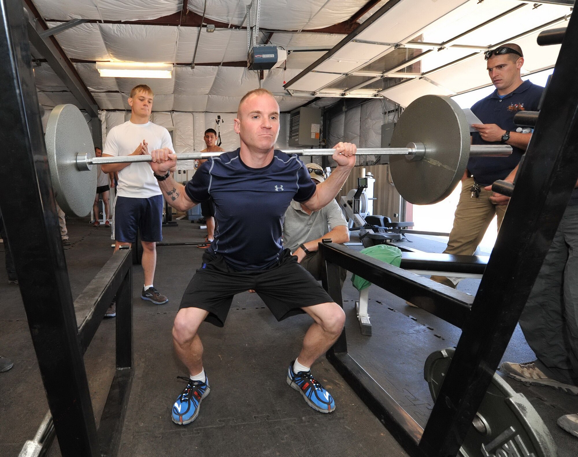 Weightlifting was one of the events at the 21st Ordnance Company Challenge, a three-day team competition at Kirtland testing physical and mental fitness. (Photo by Ken Moore)
