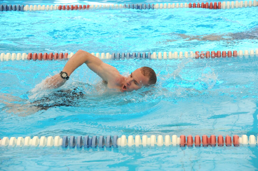 Swimming was one of the events at the 21st Ordnance Company Challenge, a three-day team competition at Kirtland testing physical and mental fitness. (Photo by Dennis Carlson)