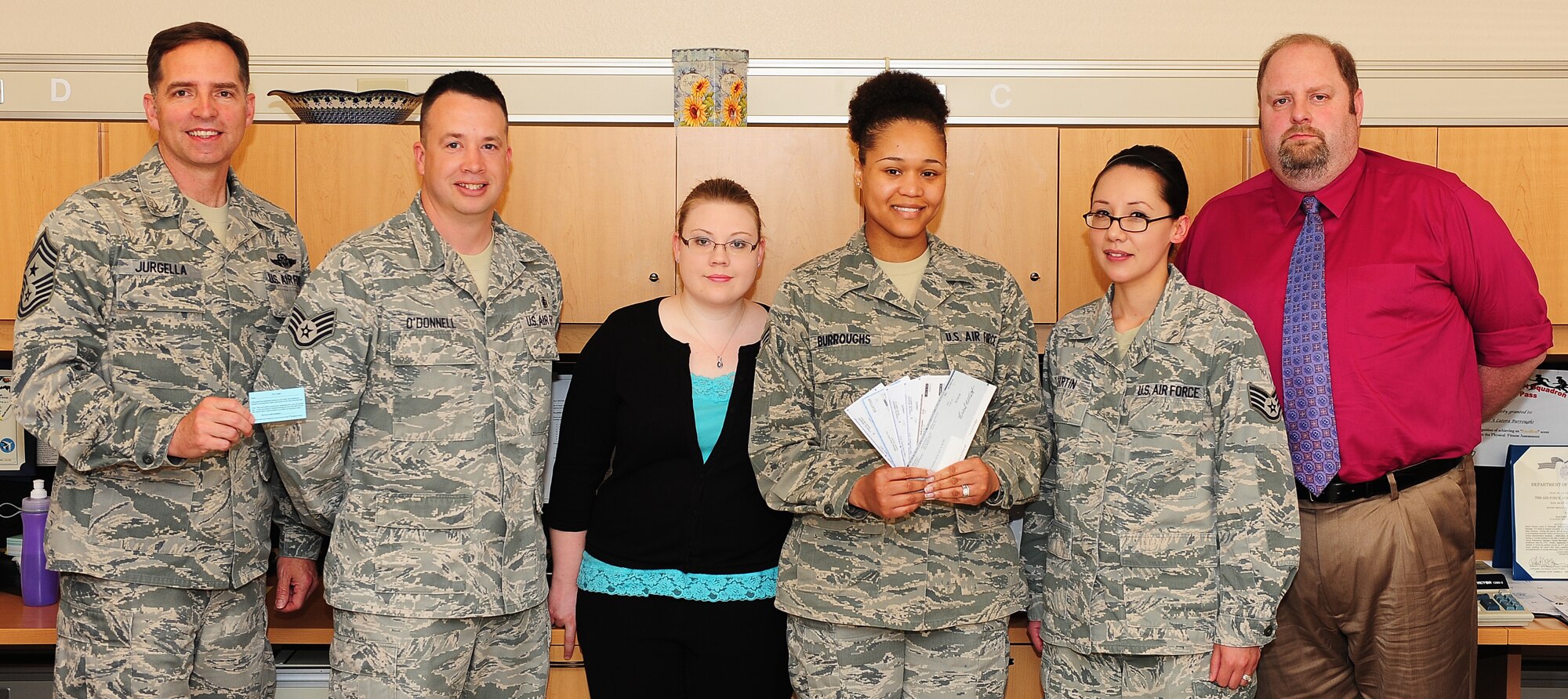 MINOT AIR FORCE BASE, N.D. -- The Resource Management Operations section is the 5th Medical Group's point-of-contact for all medical resources and is the advisor to the 5th MDG commander for the management of a $9 million annual budget. RMO also manages nearly 300 personnel authorizations distributed among 29 offices in the Medical Group and a $700,000 staff and patient travel budget. Additionally, the office recaptures funds owed to the Medical Treatment Facility through its three reimbursement programs:  Third Party Collections, Medical Affirmative Claims and Medical Service Accounts. These programs allow the Medical Group to deliver its 12,700 beneficiaries seamless quality health care. (Photo courtesy of the Command Chief’s Office)