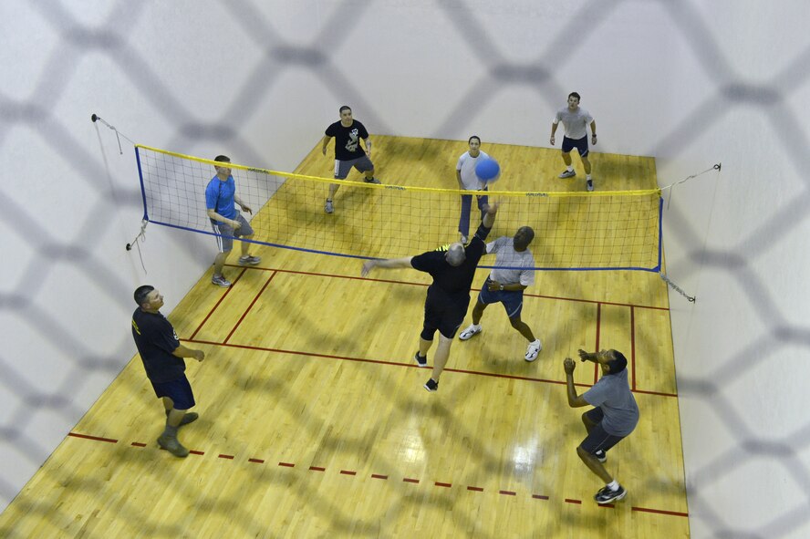 Airmen from Air Force Global Strike Command, play walleyball at the Senior Airman Bryan Bell Fitness Center on Barksdale Air Force Base La., May 22, 2013.  The fitness center offers a variety of sports for Airmen to play such as football, softball, dodgeball, walleyball, basketball, racquetball, kickball and volleyball. (U.S. Air Force photo/Senior Airman Micaiah Anthony)