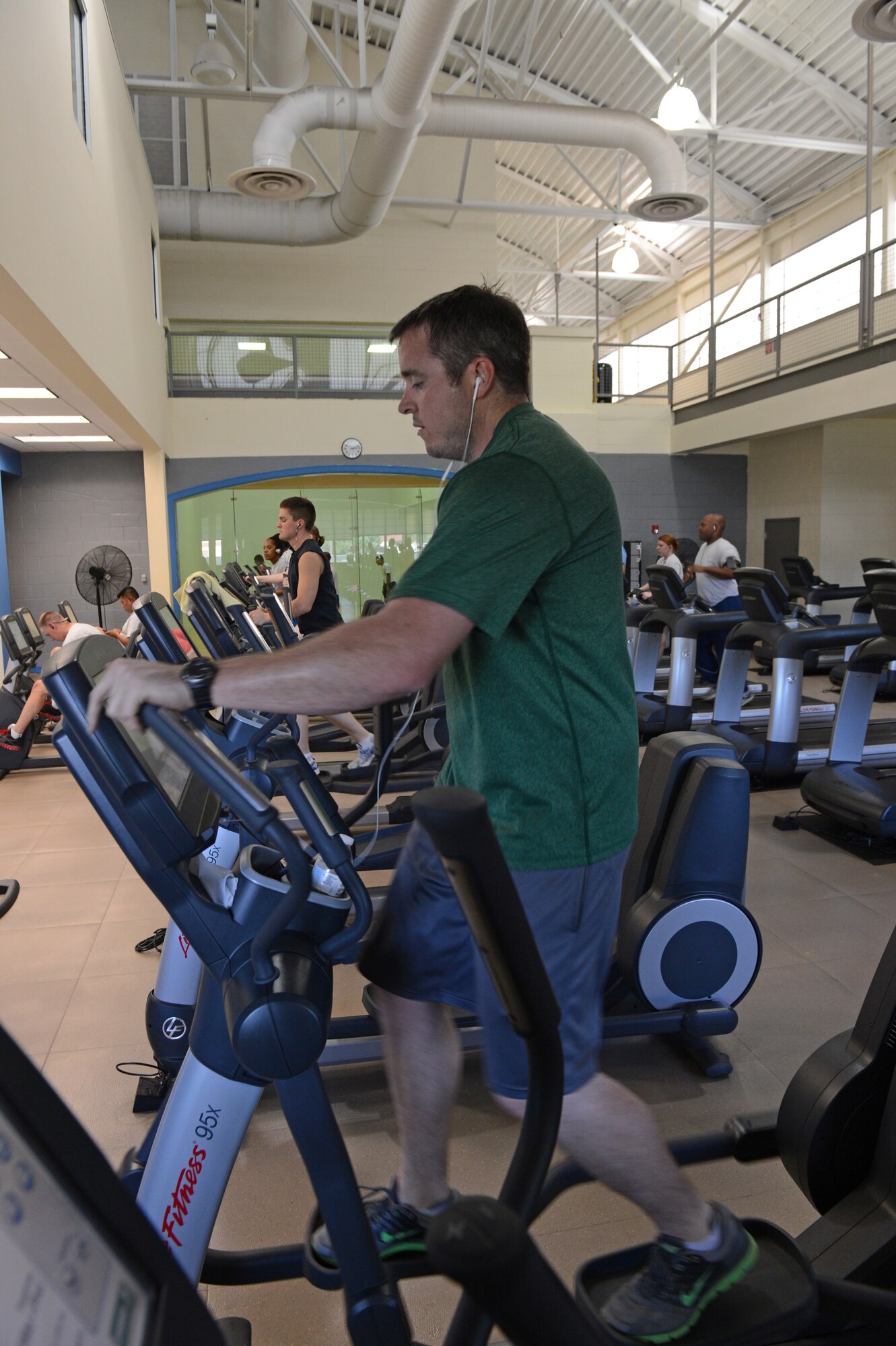 Patrons of the Senior Airman Bryan Bell Fitness Center run on treadmills on Barksdale Air Force Base, La., May 22, 2013. The fitness center is open to all personnel with a military ID card. (U.S. Air Force photo/Senior Airman Micaiah Anthony)