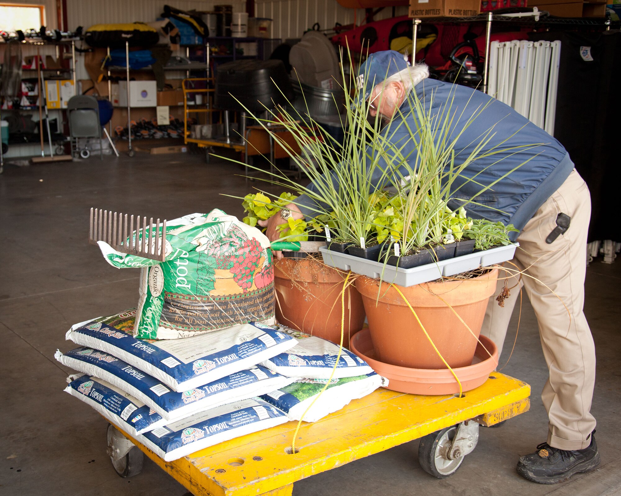 Members of the 934th Airlift Wing do some spring sprucing up during the annual Base Clean up Day at the Minneapolis-St. Paul Air Reserve Station, Minn.  (U.S. Air Force photo/Shannon McKay)