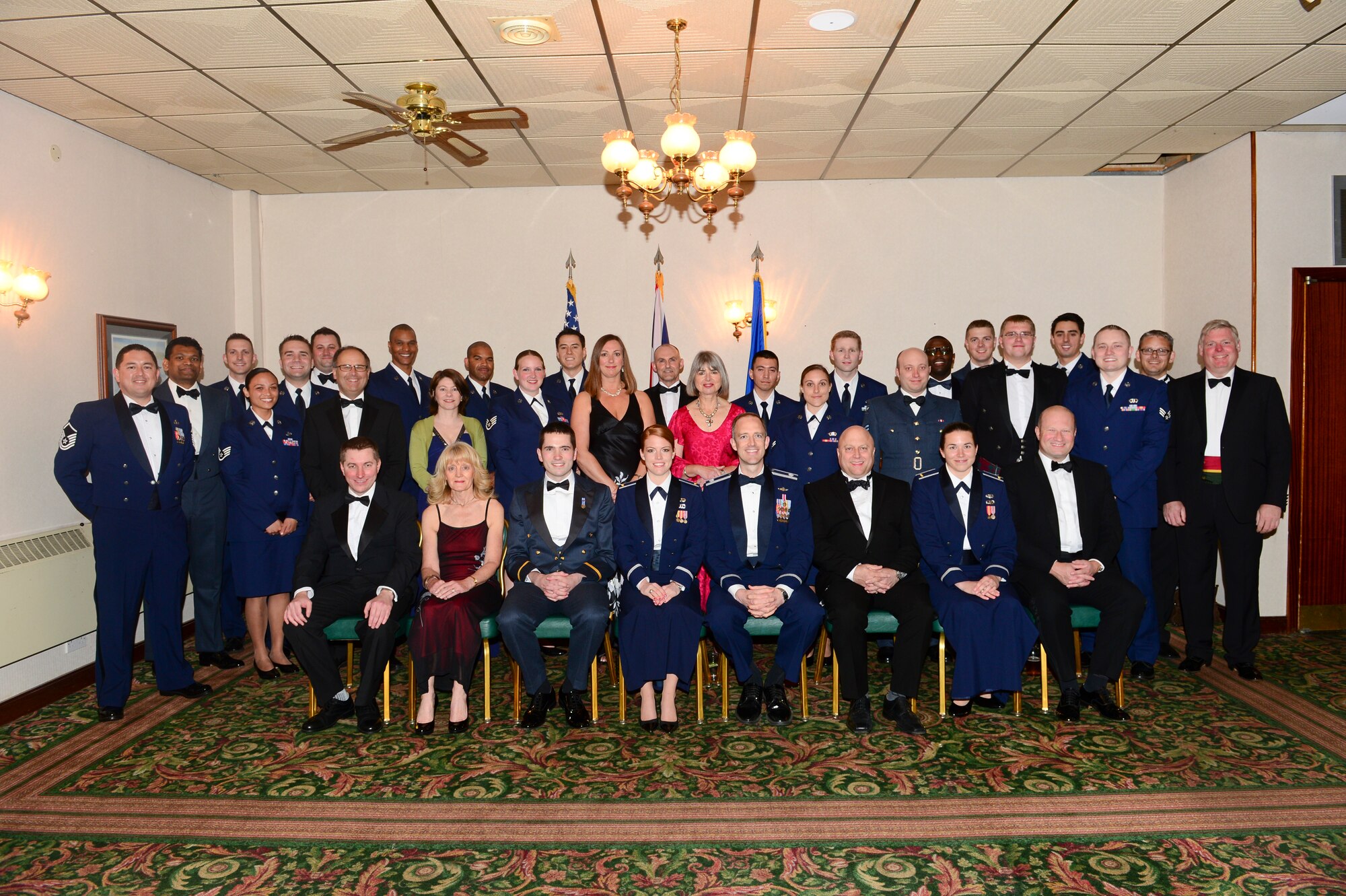 ROYAL AIR FORCE LAKENHEATH, England -- Thirty-six East Anglian air traffic controllers pose for a group photo during the air traffic control dining-out at RAF Lakenheath Eagle’s Landing, May 18, 2013. East Anglian air traffic controllers celebrated the partnership between the joint services during the 11th annual dining-out. (U.S. Air Force photo by Staff Sgt. Stephanie Mancha) 