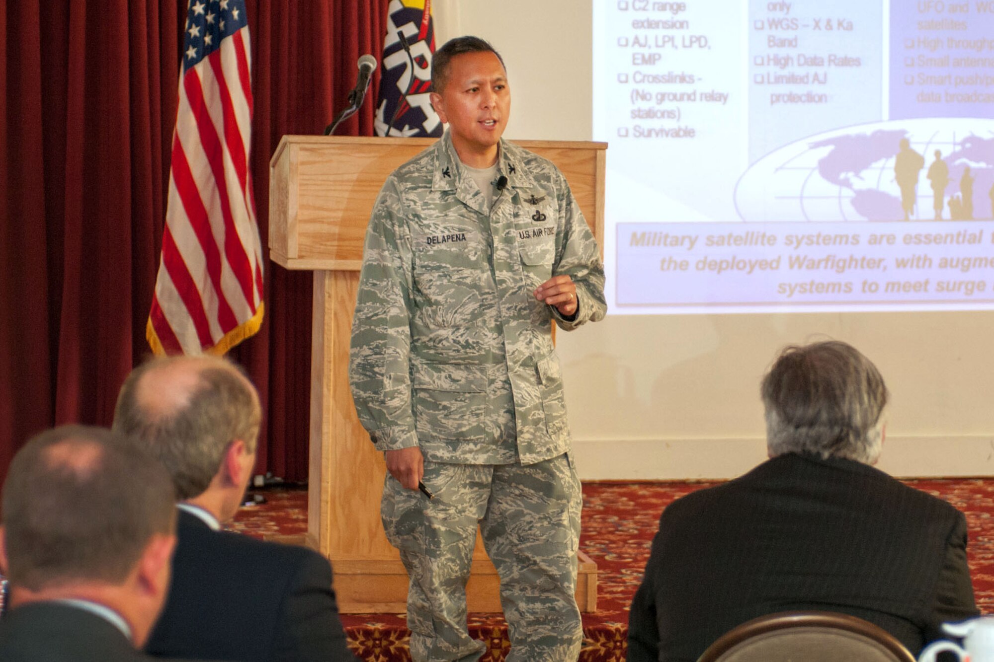 HANSCOM AIR FORCE BASE, Mass. - Col. Cordell DeLaPena, Family of Advanced Beyond Line-of-Sight Terminals (FAB-T) senior materiel leader, speaks to the Hanscom Representatives Association during a luncheon meeting May 21 at the Minuteman Commons. DeLaPena highlighted challenges in the current fiscal environment as well as discussing capabilities and upcoming opportunities. (U.S. Air Force photo by Rick Berry)