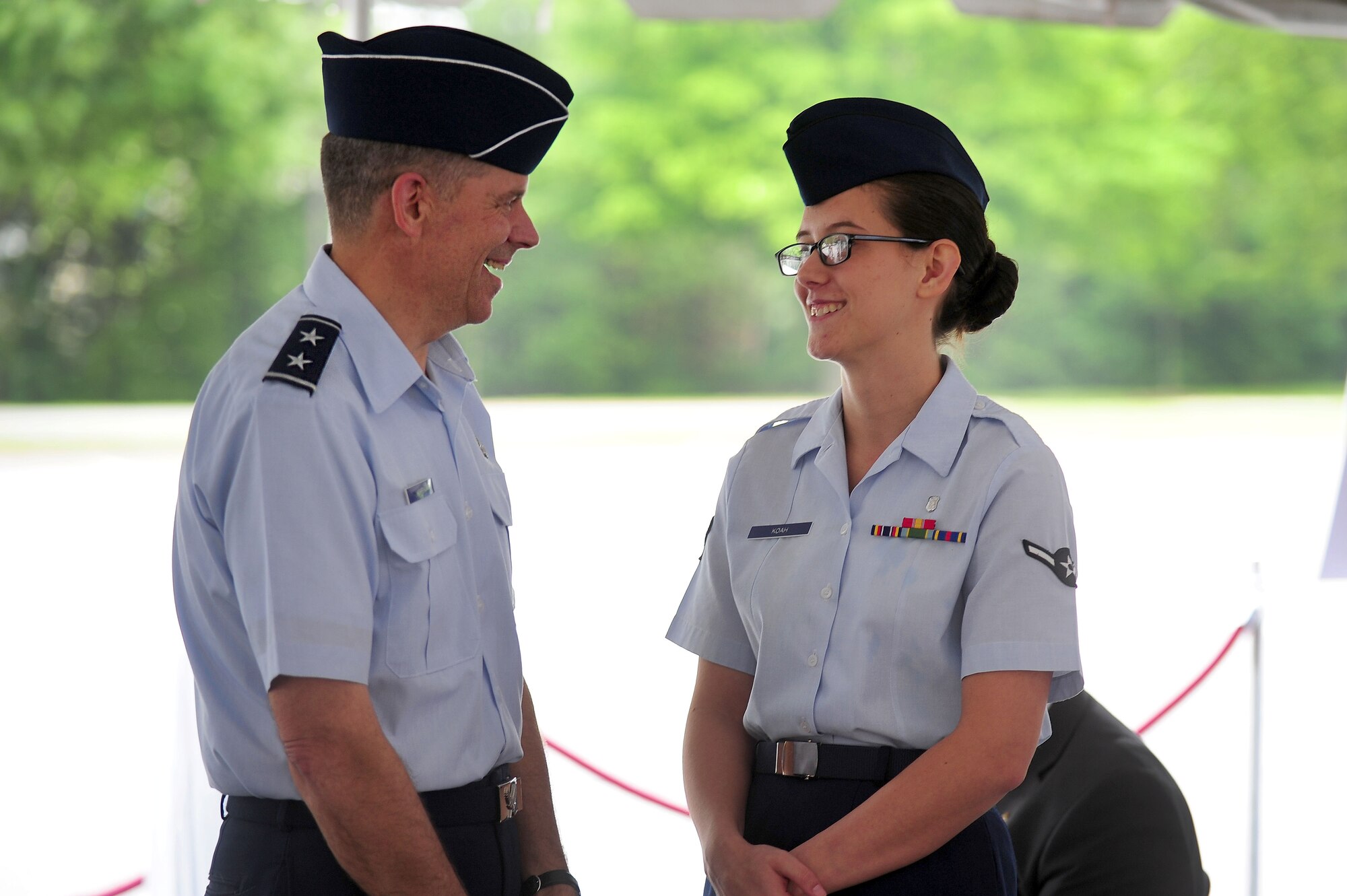 79th Medical Wing Commander Maj. Gen. Gerard Caron speaks to Airman Abby Koah, 779th Aerospace Medical Squadron, prior to a groundbreaking ceremony for the 79th MDW’s new Malcolm Grow Medical Clinic and Surgery Center and Joint Base Andrews Dental Clinic, May 22, 2013, at JBA, Md. Koah is the most junior member of the 79th MDW and assisted in the groundbreaking alongside military and civilian leadership. (U.S. Air Force photo by Senior Airman Steele C. G. Britton)