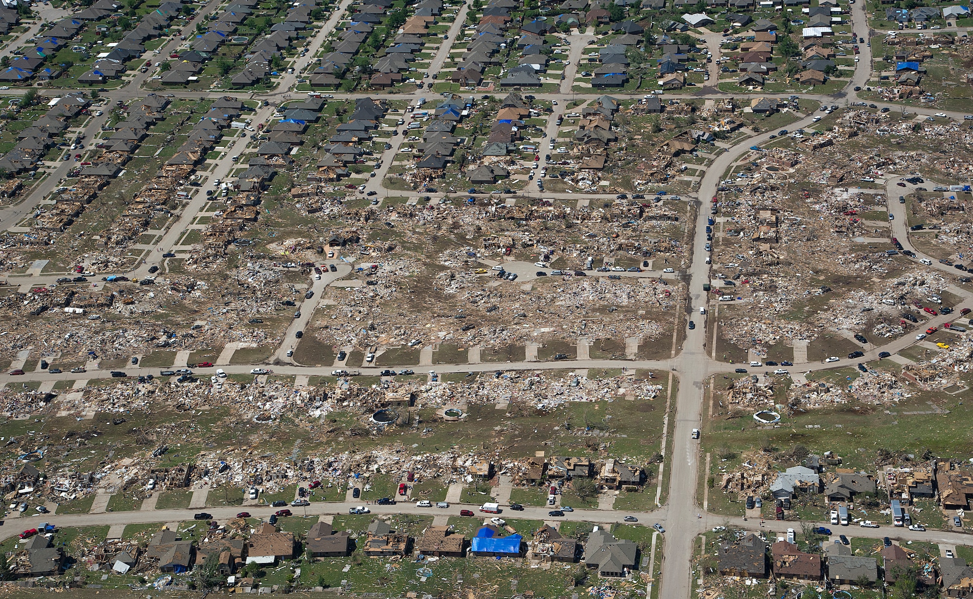 The path of a recent tornado in Moore, Okla., May 22, 2013. A tornado categorized as an EF5, the strongest category possible, with winds ranging from 200 to 210 mph struck Moore on May 20, 2013. The Oklahoma Office of the Chief Medical Examiner reports 24 fatalities related to Monday's storms. (U.S. Air Force photo by Tech. Sgt. Bradley C. Church)