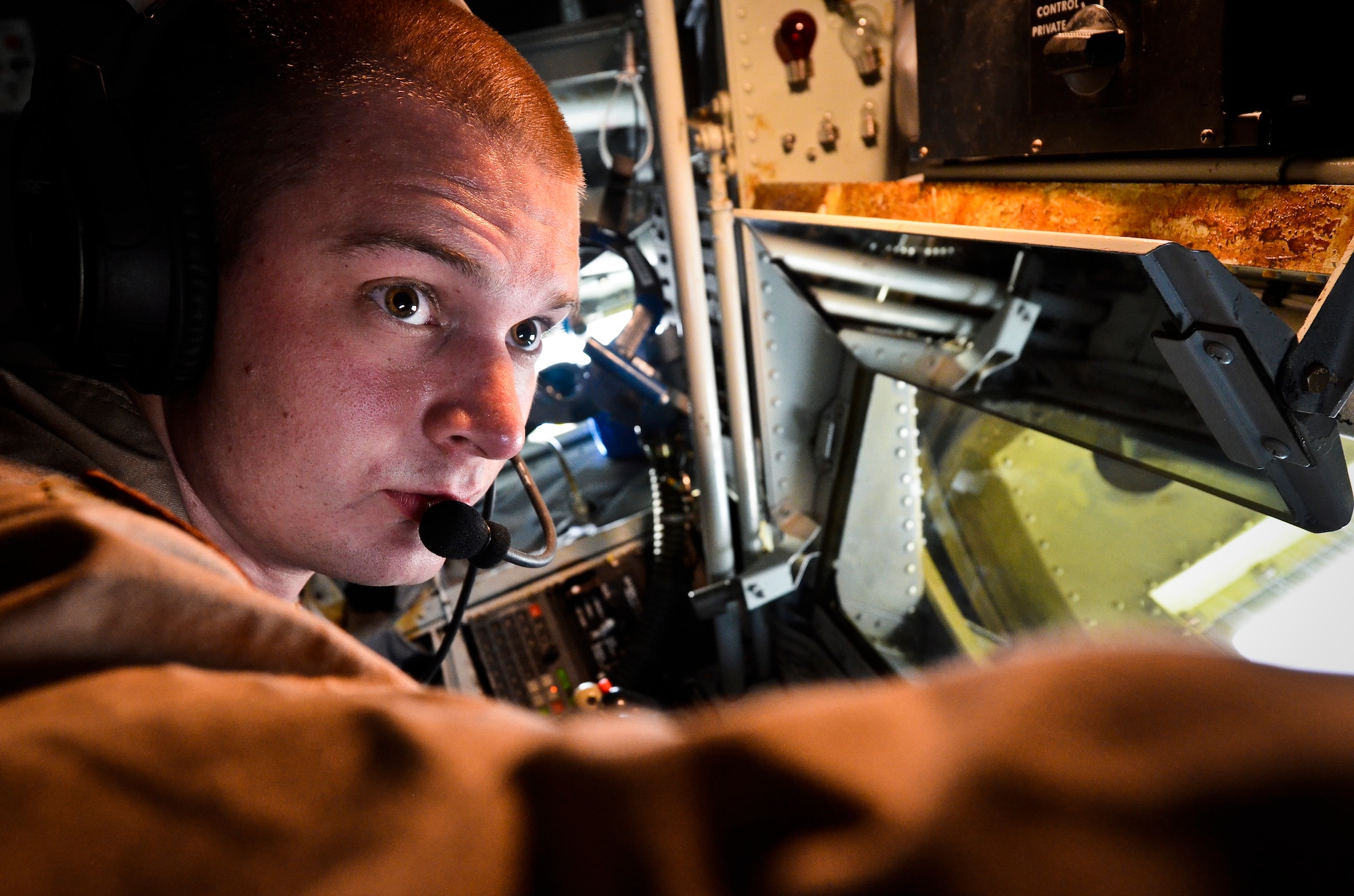 Senior Airman Rich Bradford executes pre-flight checks on aircraft “57-1419,” May 18, 2013, at the 379th Air Expeditionary Wing in Southwest Asia. Bradford is a 340th Expeditionary Air Refueling Squadron boom operator deployed from Scott Air Force Base, Ill. Aircraft 57-1419 is a KC-135 Stratotanker deployed from the 190th Air Refueling Wing of the Kansas Air National Guard. (U.S. Air Force photo/Senior Airman Benjamin Stratton)