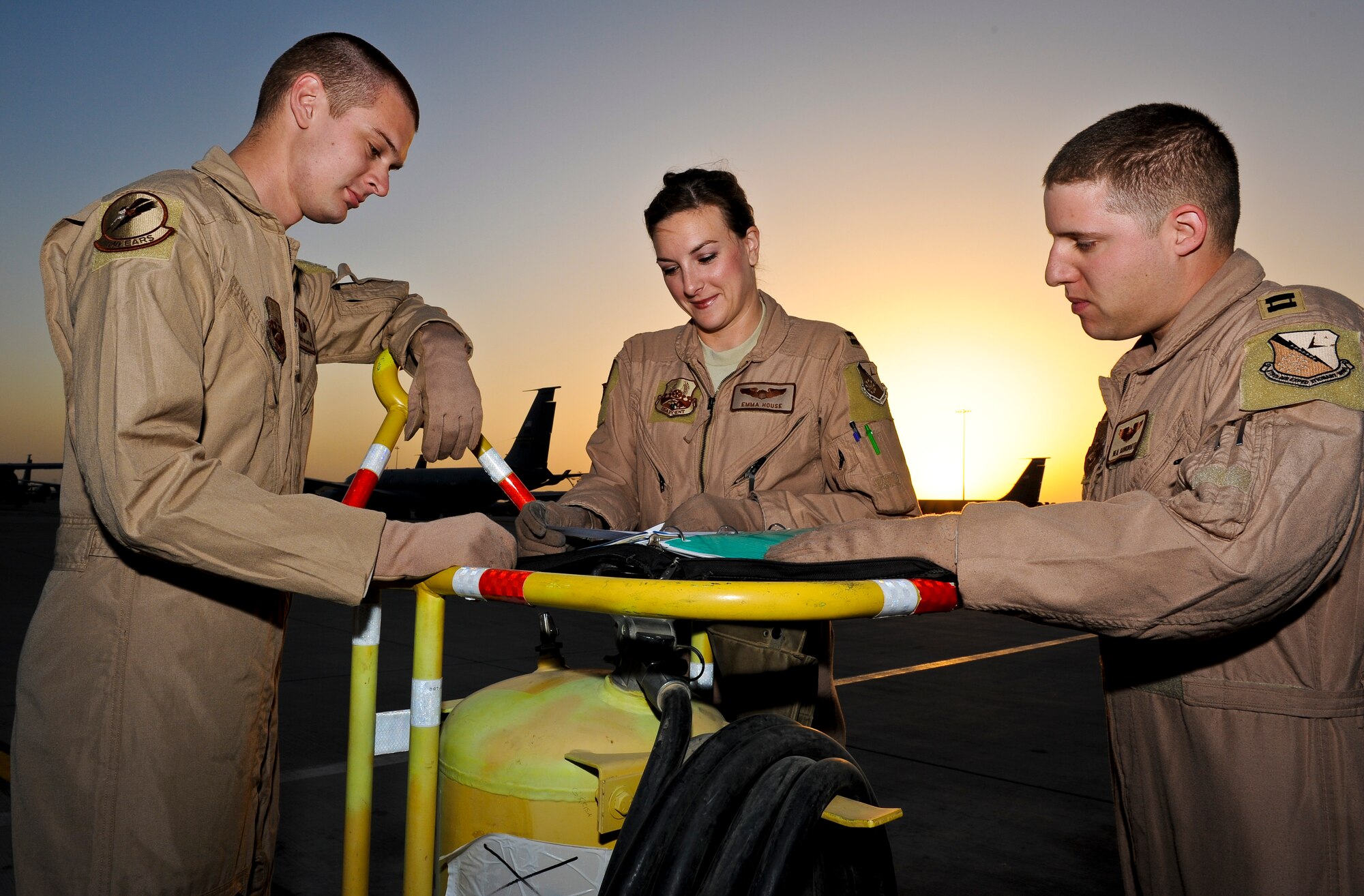 The aircrew, currently assigned to the oldest jet in the Air Force, “57-1419,” review their pre-flight checklists May 18, 2013, at the 379th Air Expeditionary Wing in Southwest Asia. Aircraft 57-1419 is a KC-135 Stratotanker deployed from the 190th Air Refueling Wing of the Kansas Air National Guard. (U.S. Air Force photo/Senior Airman Benjamin Stratton)