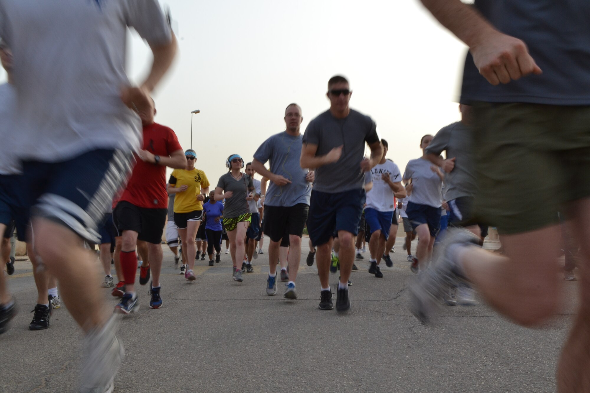 Members from the 64th Air Expeditionary Group run a 5K during the Police Week activities at Eskan Village in Southwest Asia, May 16, 2013. (U.S. Air Force photo/Staff Sgt. Jason Colbert)