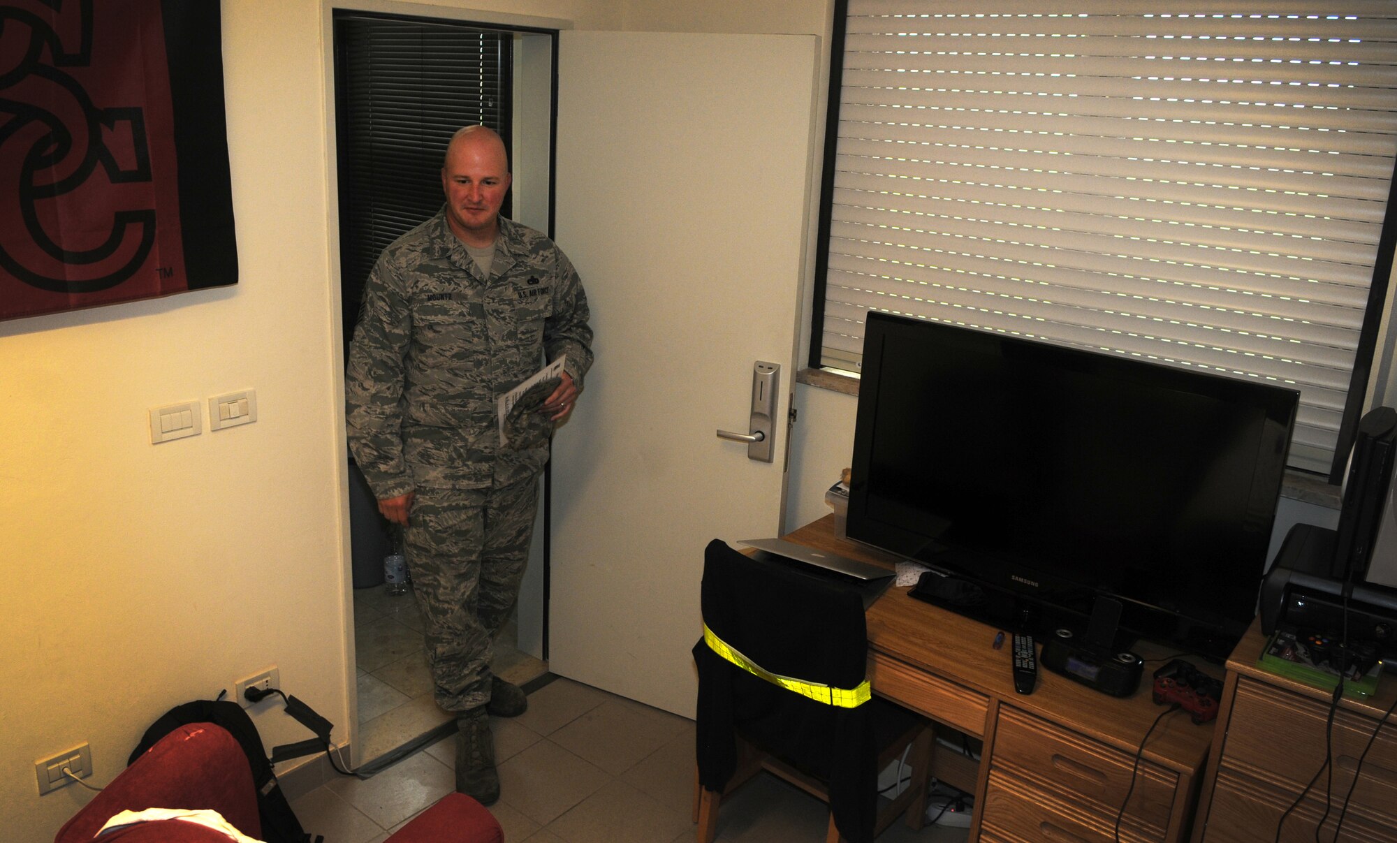 Master Sgt. Steven Mountz, 31st Comptroller Squadron first sergeant, inspects a dormitory room May 22, 2013 at Aviano Air Base, Italy. Airmen living in Air Force dormitories are subject to an inspection once a month to ensure health and safety standards are adhered to. (U.S. Air Force photo/Airman Ryan Conroy) 