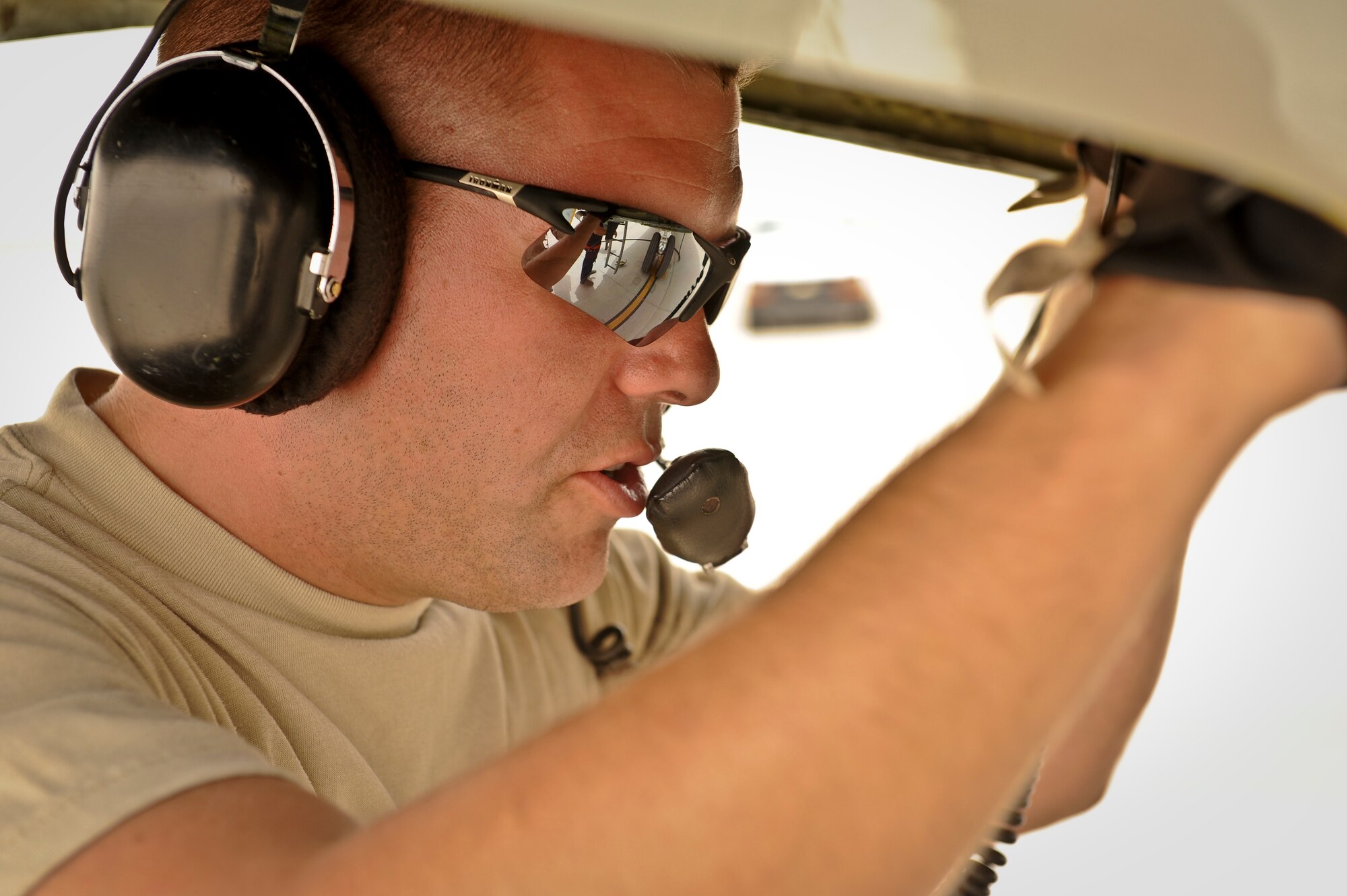 Tech. Sgt. William Dibble completes post-flight maintenance checks for a recently arrived RC-135 Rivet Joint May 22, 2013, at the 379th Air Expeditionary Wing in Southwest Asia. Dibble is the aircraft’s dedicated crew chief from the 763rd Aircraft Maintenance Unit deployed from Offutt Air Force Base, Neb. (U.S. Air Force photo/Senior Airman Benjamin Stratton)