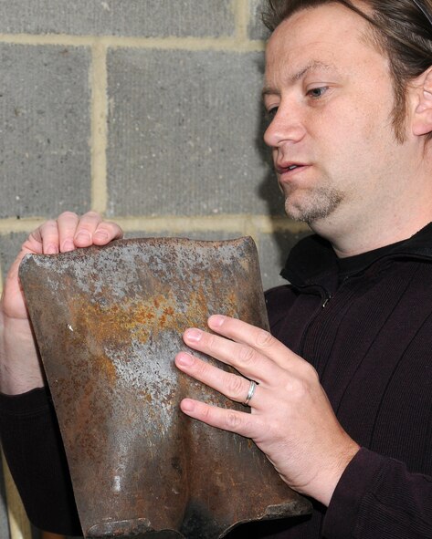 Donald Fox, 100th Logistics Readiness Squadron Quality Assurance inspector from Three Oaks, Mich., inspects garden equipment and tools belonging to Chief Master Sgt. Randy Ymker, 100th Mission Support Group superintendent from Kay Warden, Iowa, May 22, 2013, at Ymker’s residence near RAF Mildenhall, England. The Quality Assurance office on RAF Mildenhall conducts inspections at residences of service members throughout all of East Anglia. (U.S. Air Force photo by Gina Randall/Released)