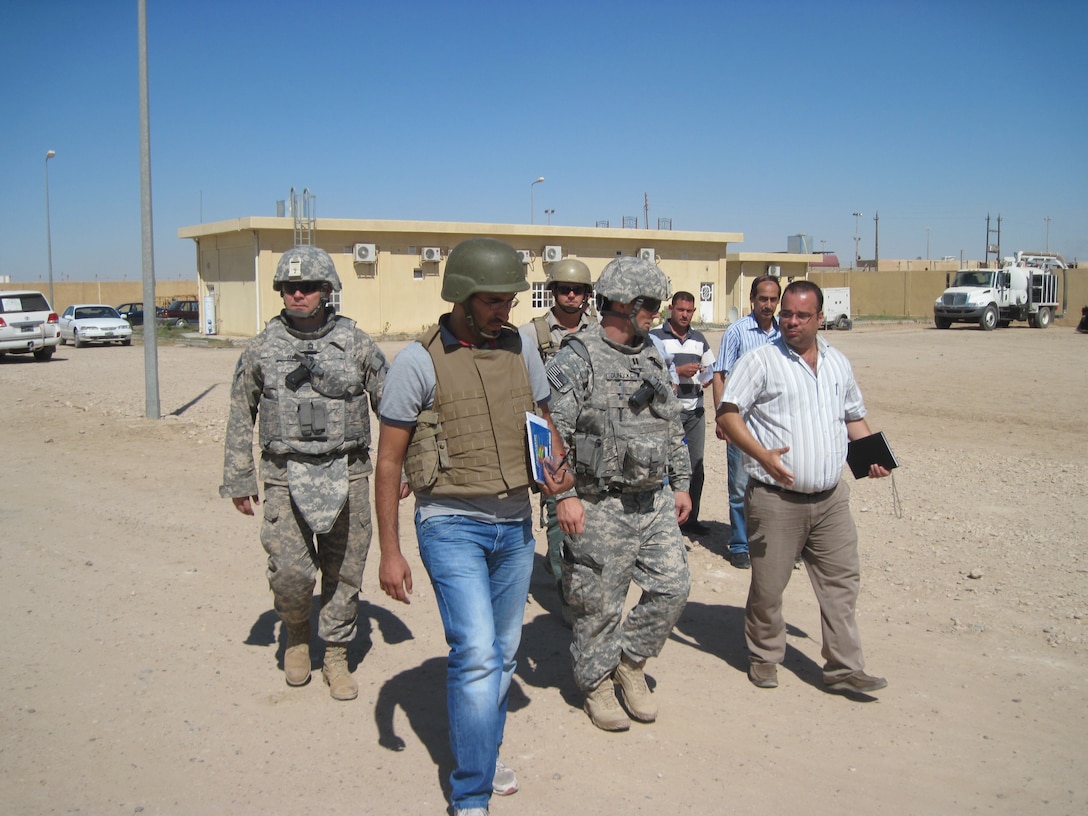 Iraq Area Office members perform a site visit the Fallujah wastewater treatment plant where the Middle East District provides operations and maintenance support and training. (Photo courtesy of Ted Upson.)