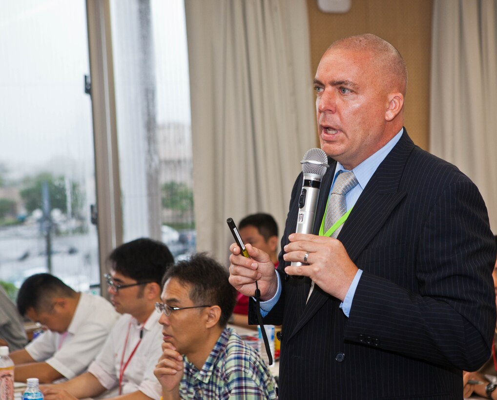 Dr. Robert D. Eldridge talks about actions taken by the Americans during Operation Tomodachi at a disaster management conference May 17 at the University of the Ryukyus Hospital’s Okinawa Clinical Simulation Center in Nishihara. More than 100 people with the University of the Ryukyus, medical professionals, service members and Department of Defense employees attended a disaster management conference to plan for future disaster relief efforts. Eldridge is the deputy assistant chief of staff for G-7, government and external affairs, Marine Corps Installations Pacific. (U.S. Marine Corps photo by Pfc. Kasey Peacock/Released)